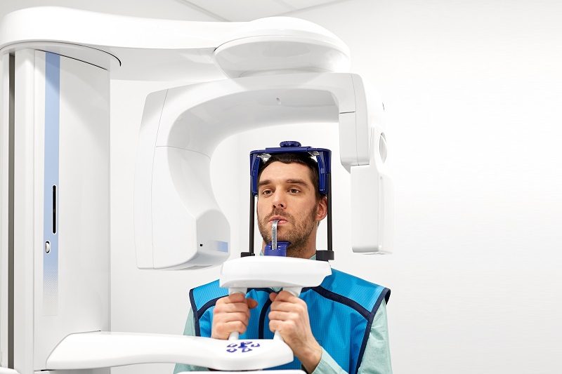 patient receiving cone beam scan