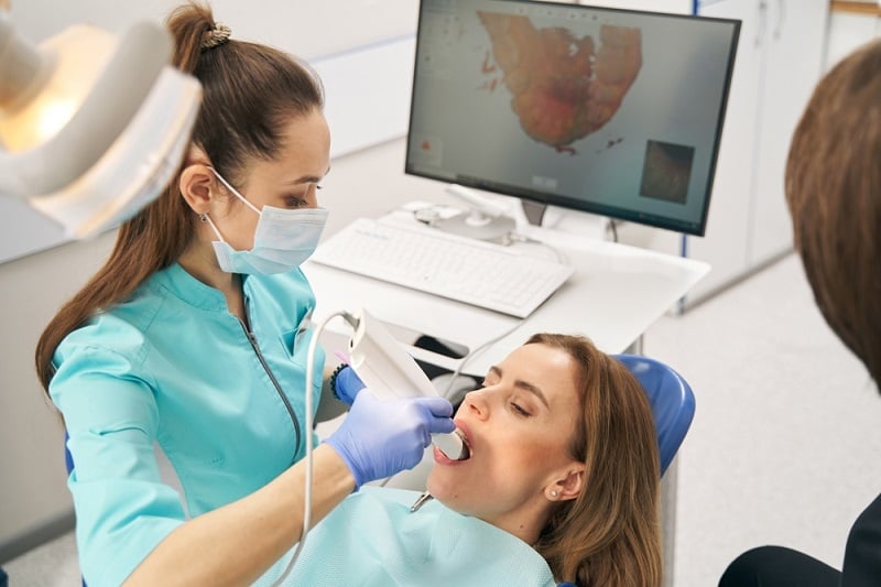 taking digital scan of patient