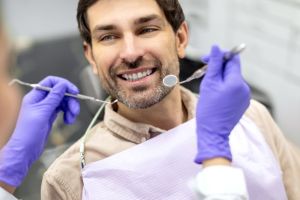 man at a prosthodontist appointment